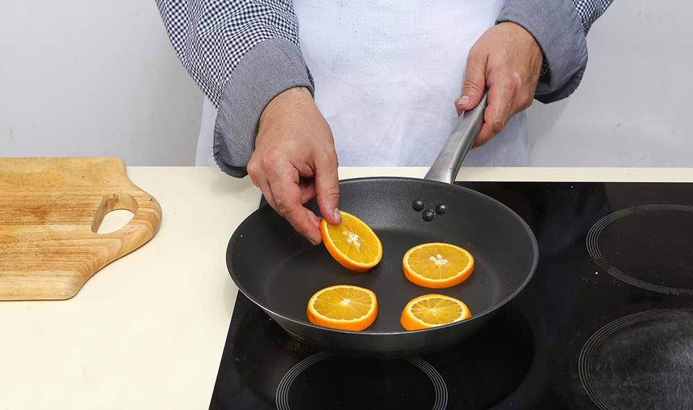 Апельсины на сковороде